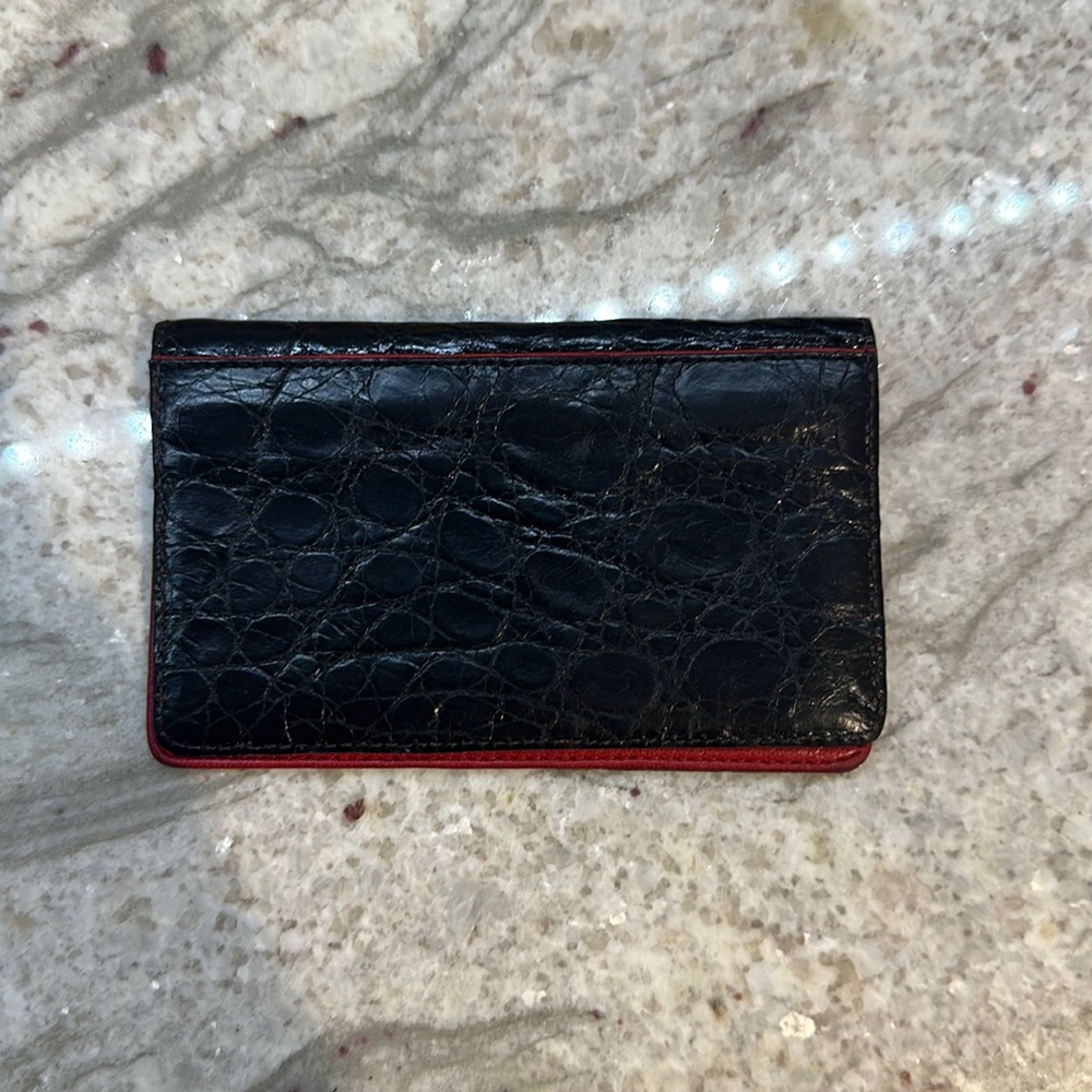 Nancy Gonzalez For Burgdorf Goodman wallet